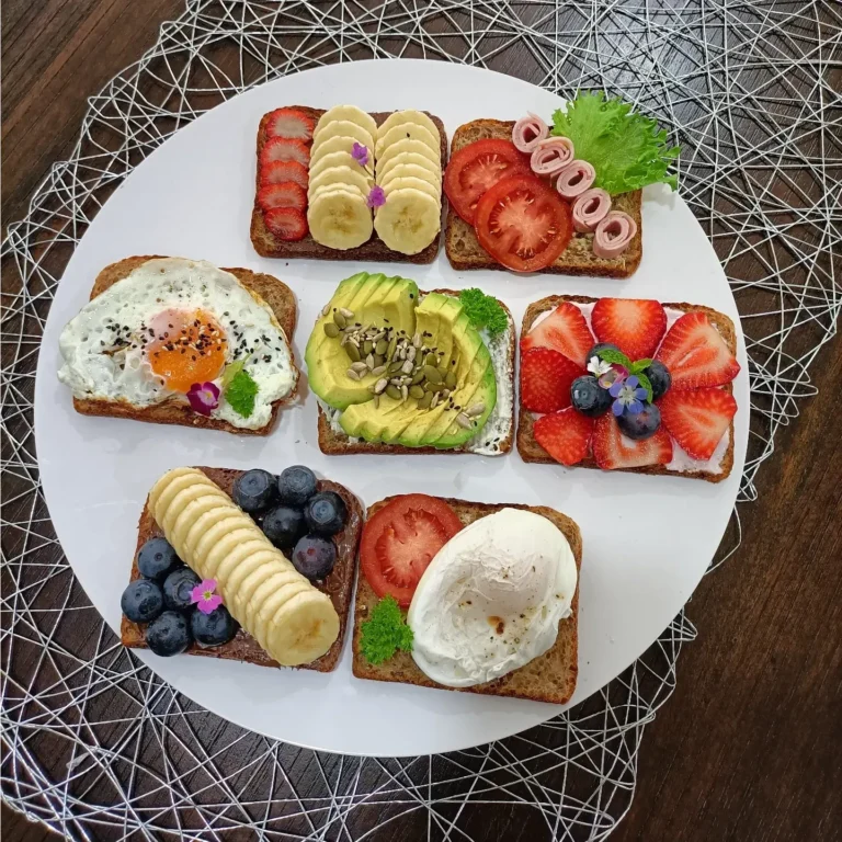 assorted gourmet toast platter with avocado egg fruit and toppings