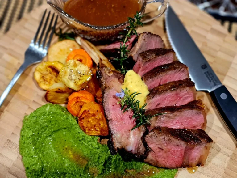 medium-rare-steak-roasted-vegetables-green-herb-sauce-fine-dining