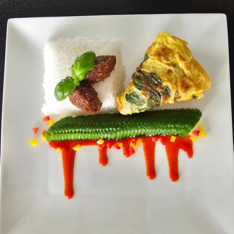thai-inspired-plated-rice-omelette-chilli-sauce-artistic-presentation