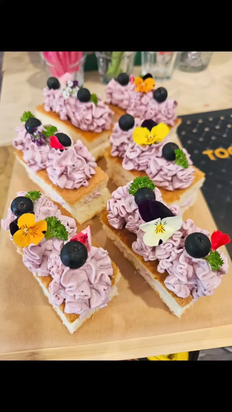 purple-icing-sponge-cake-slices-gourmet