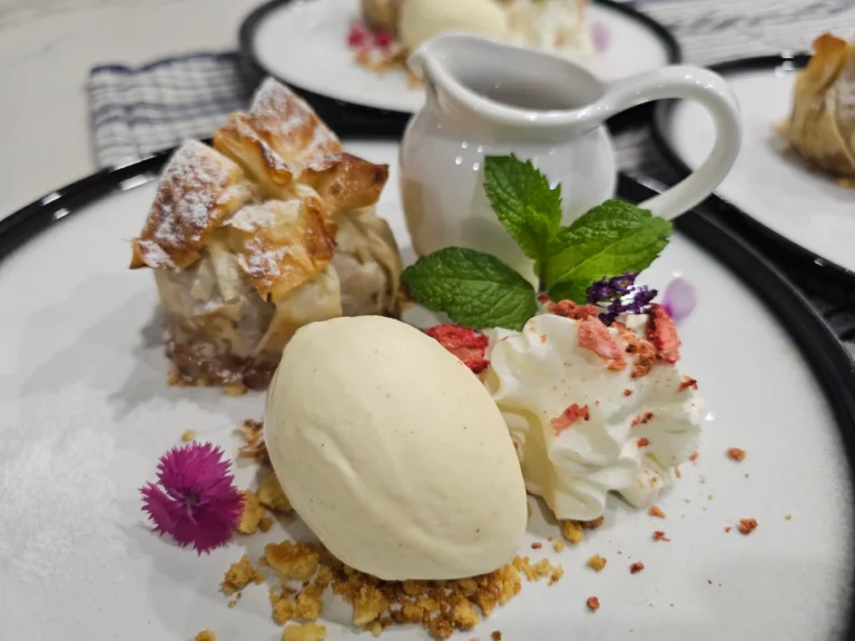 apple-strudel-vanilla-ice-cream-whipped-cream-edible-flowers-mint-private-chef-dessert