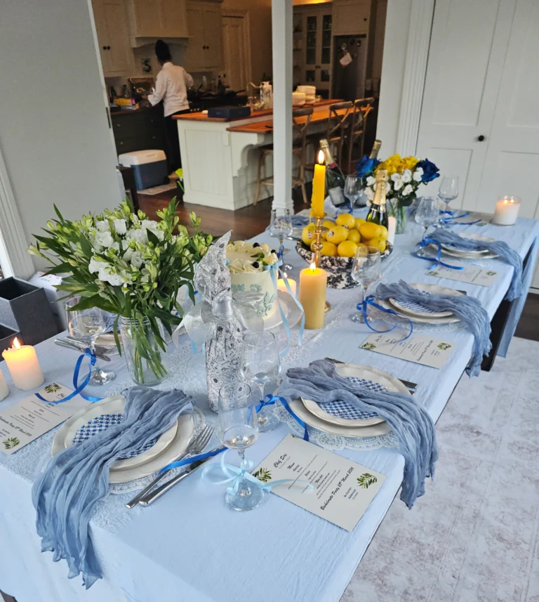 bachelorette-party-blue-white-table-setting-candles-lemons-champagne-chef-cooking-background