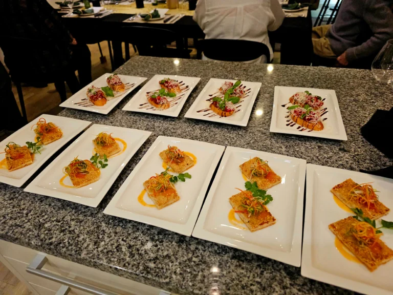 bruschetta-sesame-crusted-fish-plated-appetisers-granite-counter-private-chef-service